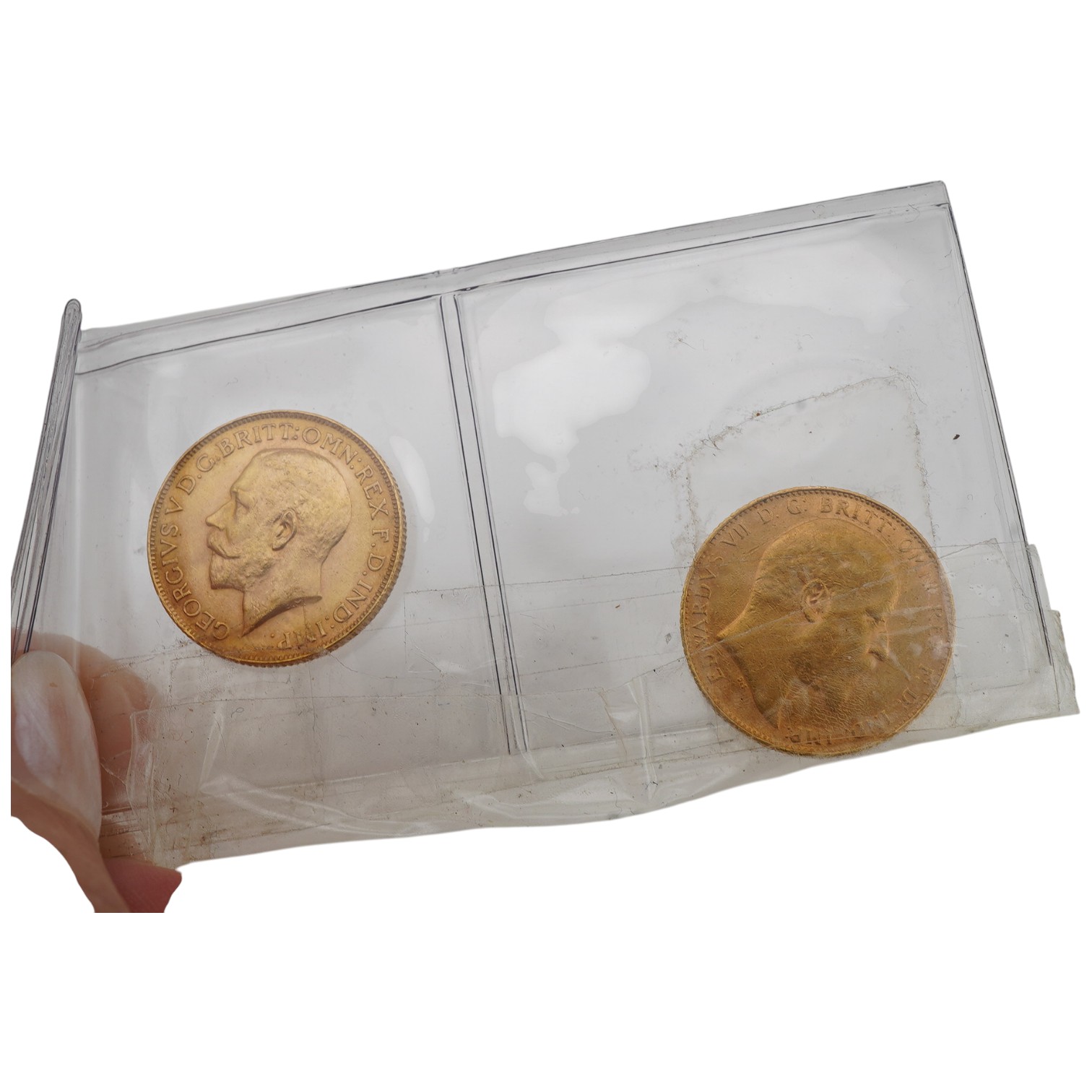 Two gold Sovereign coins, one Edward VII, dated 1908, the other George V, dated 1928